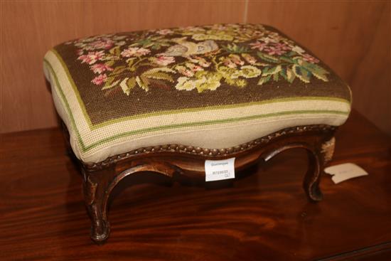 Two Victorian mahogany footstools, raised on cabriole legs W.89cm and 40cm